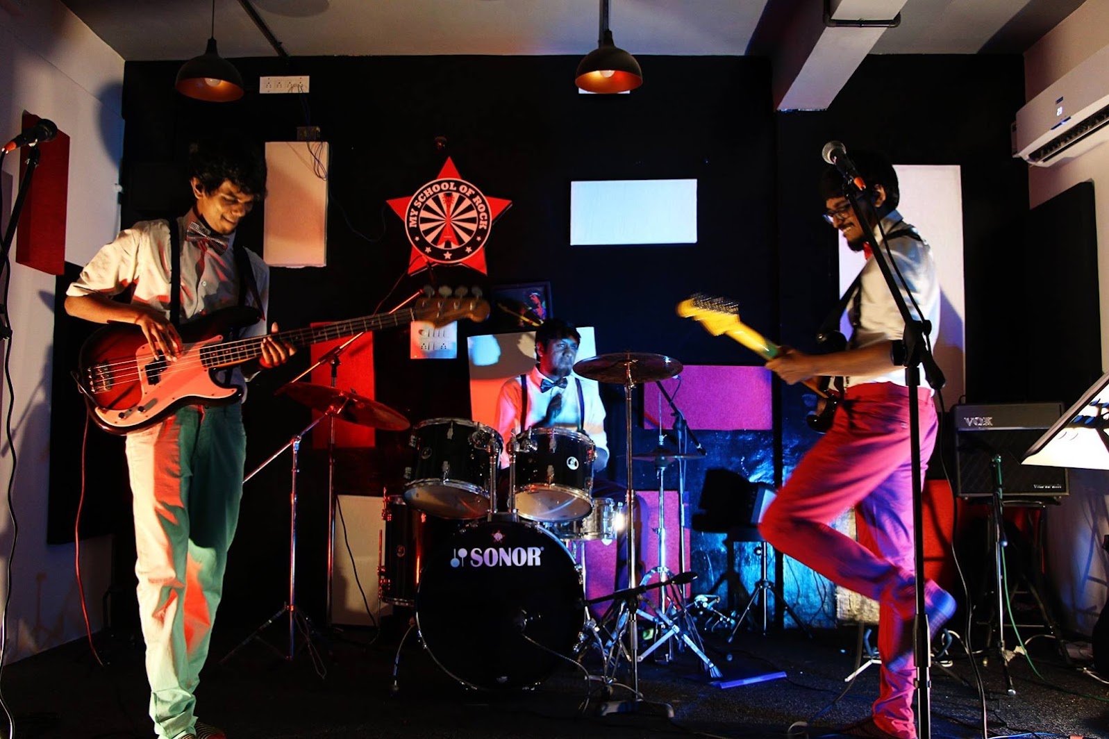 Live performance with guitar and drums at My School Of Rock in Koramangala
